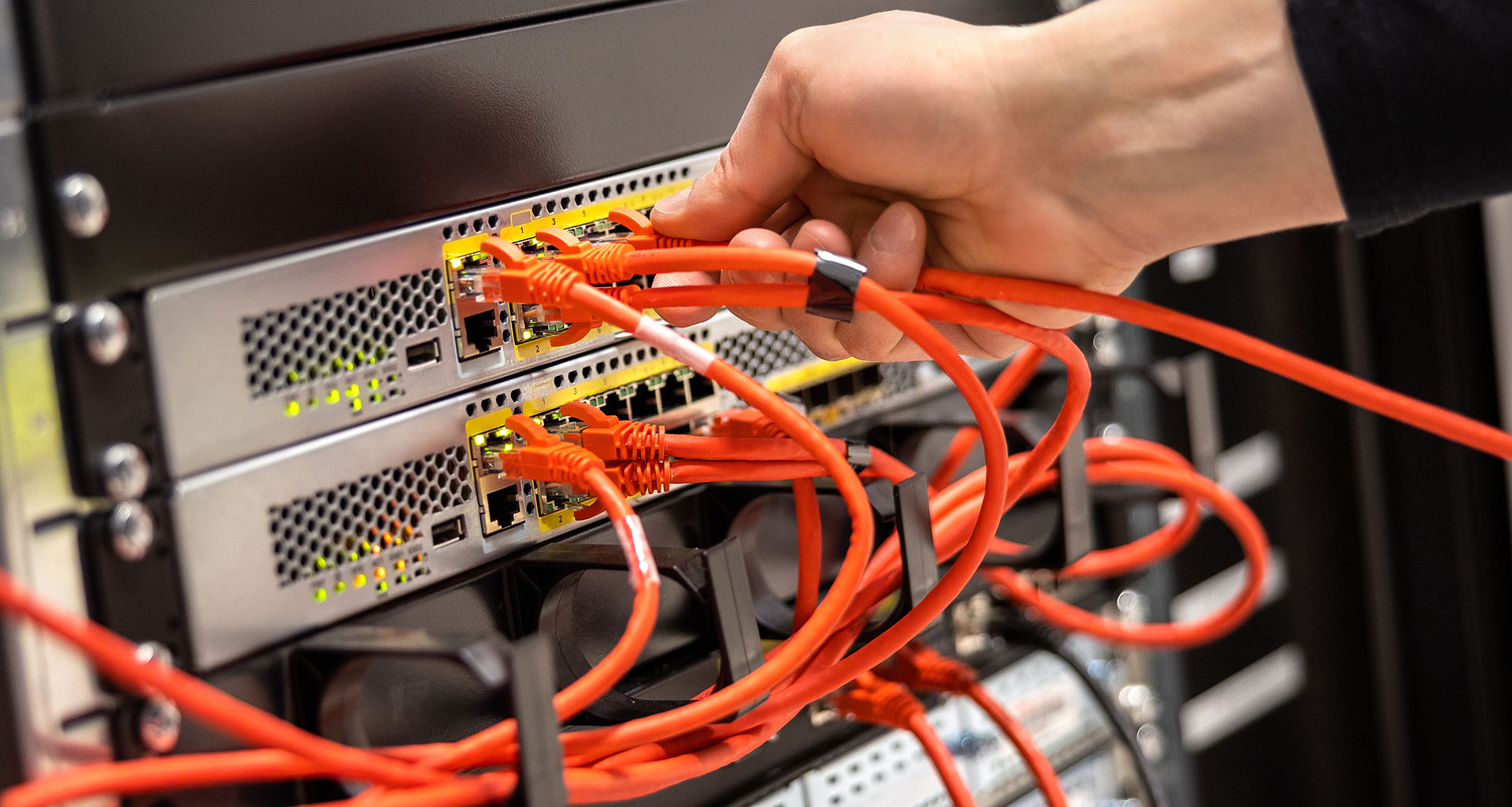 Network cables being connected to server
